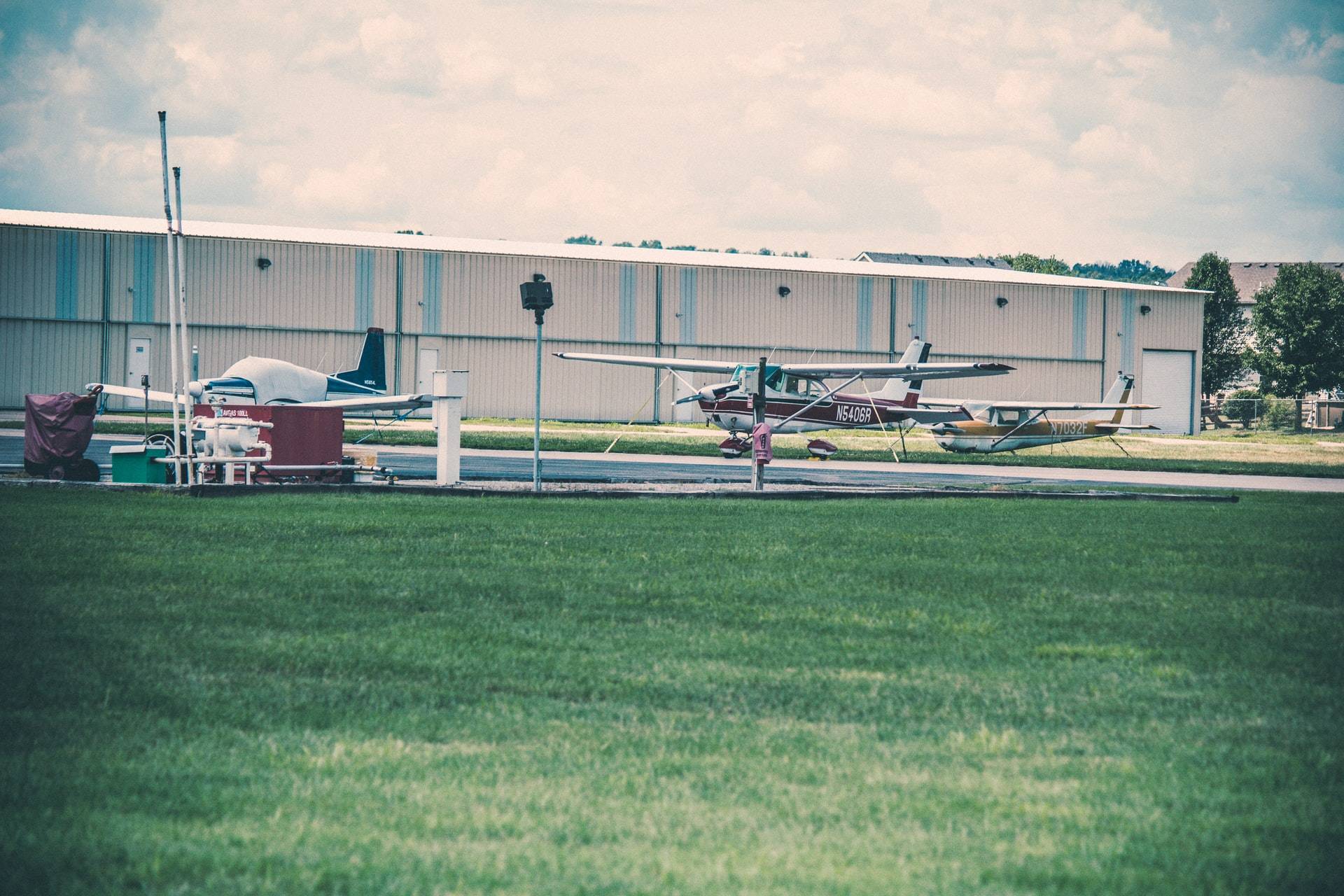 Planes parked at a small airport
