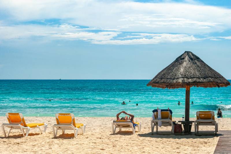 People relaxing at the beach in Cancun, Mexico